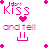 Pixelated pink text and symbols on white background: 'Kiss' above heart, 'and tell' below, four corner crosses.