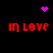 Pixelated red text 'in love' appears in four quadrants on a black background, with purple pixel hearts and starbursts animating above and below the text.