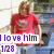 Pixelated image of a person in red clothing with text overlay reading "I love him" and "1/28" below.