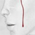 A static image shows a stylized figure with a white head and dark lower body against a light background, with a vertical red-brown line on the right.