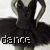 Pixelated black-and-white image of a figure in a ballet pose with arms raised, wearing a dark tutu and leotard, with the word 'dance' displayed below.