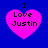Four identical pink heart-shaped icons with black text "I Love Justin" on a solid blue background, arranged in a