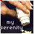 A hand holds a white cylindrical object against a dark background with 'my serenity' text below.