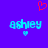 Pixelated blue text 'ashley' on purple background with red heart above and small blue heart below, two versions showing slight pixel differences.