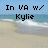 Pixelated beach scene with text 'In VA w/' and 'Kylie' overlaid on blue sky, ocean, and sandy shore.