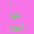 Two side-by-side display pixelated text on solid backgrounds; left is pink with green text, right is green with pink text