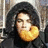 Pixelated image of a person with long dark hair holding a glowing yellow object near their face against a blurred background.