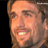 Pixelated close-up of a person's face with visible facial features and partial hair, displayed as a static 48x48 buddy icon on a black background.
