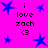 A static image with a bright pink background featuring blue star shapes and repeated text "i love zach <3" in black pixelated font.