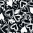 Static pixelated image with high-contrast black and white pattern resembling abstract geometric shapes or fragmented text.