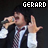 Pixelated image of a person in formal attire holding a microphone, with 'GERARD' text above the head against dark background.