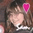 A pixelated image of a person with brown hair wearing a dark top, featuring a pink heart symbol above the head and white text on the chest.