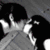 A four- shows a black-and-white photo of two people kissing, a cartoon with text, a heart, and a person holding a colorful object