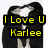 Pixelated image of two figures in black clothing embracing, with yellow text overlay reading 'I Love U Karlee' on a white background.