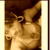 A sepia-toned animated icon shows a figure with tied hair and flowing fabric, shifting between two poses against a dark background.