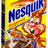 Pixelated image of a cereal box with a cartoon tiger, blue text reading 'Nesquik!', and yellow background.