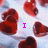 A pixelated image with red hearts on a light blue background, displaying text that changes from 'I' to 'LOVE' then 'MARY'.