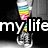 A pixelated image shows a colorful, rainbow-striped object resembling a microphone or microphone stand with a pink base, positioned above the text 'my life' in white lowercase letters on a black background.