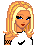 Pixelated image of a blonde woman with blue eyes and red lips, wearing a white top with black accents.