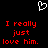 A black background displays a white pixelated heart symbol above red pixelated text reading "I really just love him." repeated twice.