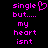Pixelated text in bright pink on black background reads 'single but.... my heart isnt' with a broken heart symbol replacing the letter O in 'heart'.