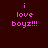Pixelated text 'i love boyz!!!' in pink on dark brown background with shifting pink rectangular overlays.