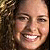 A pixelated contact sheet showing a smiling woman's face on the left and stylized text reading "Fullman" on the right against a black background.