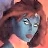 Pixelated close-up of a character with light blue skin, dark hair, and closed eyes against a gradient background.