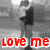 A split-screen image with a grayscale figure on the left and a blue background with red heart outline on the right, featuring 'love me' text in red at bottom left.
