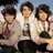 Group of people in various poses and clothing styles across multiple with no visible text or animation changes