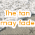A static image with orange text over a beach background showing waves and sand, displaying phrases about fading tan memories staying.