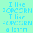 Four display pixelated text "I like POPCORN I like POPCORN a lotttt" in varying blue and cyan color schemes