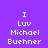 Pixelated text on a split background with purple and light purple sections, displaying 'I Luv Michael Buehner' in white block letters.