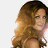 Pixelated image of a woman with long wavy hair next to teal text reading 'faith Hill' on white background