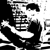 Black-and-white pixelated image with a partial figure on the left and repeated 'SAM' text across two lines.