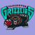 Pixelated icon with teal text 'Grimm' above a brown creature with red eyes and a black body on light purple background.