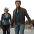 Two pixelated figures stand side-by-side holding hands against a blurred background with indistinct green and brown tones.