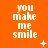 Orange background with repeated white text "you make me smile" in pixelated font, scattered small white plus and star symbols.