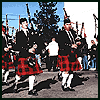 Six- of static images showing people in various settings including bagpipers, individuals with tattoos, and a person at a podium