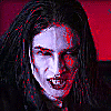 A animated sequence shows a pale-skinned figure with long dark hair against a red background, first smiling then raising a white-gloved hand