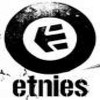 Black and white circular icon with stylized arrow symbol inside white circle, surrounded by textured black ring, with 'etnies' text below.