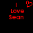Red pixelated text and heart symbol on black background, with text reading 'I Love Sean' in two identical side-by-side arrangements.