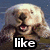 Pixelated image of a person with light hair and open mouth, overlaid with text "like" and "oh my GAWD!" surrounded by colored stars.