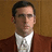 Pixelated image of a person in a brown jacket and white shirt with red text reading "I love.... lamp." on black background.
