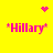 Yellow background with pink text and symbols; four instances of "*Hillary*" in pixelated font, two heart-shaped and two starburst-shaped pink pixel clusters above and below the text.