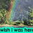 Pixelated static image shows a figure in light clothing against a blurred background with green and blue tones, text at bottom reads "wish I was here".