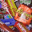 Pixelated image of colorful candy with yellow background and repeated "Candy" text in multiple positions.