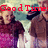 Two pixelated figures in dark clothing stand side-by-side under red text reading 'Good Time' against a muted background.