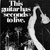 Black-and-white pixelated image showing a stylized figure holding a large object with text above it, set against dark background.