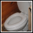 Animated sequence showing a toilet bowl with text changing from 'YO' to 'YOU SEXY TOILET.' in white pixelated font over time.